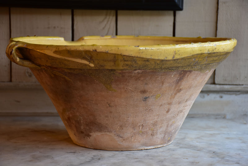 Large 19th century preserving bowl with yellow glaze