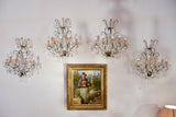 Set of four antique crystal wall sconces