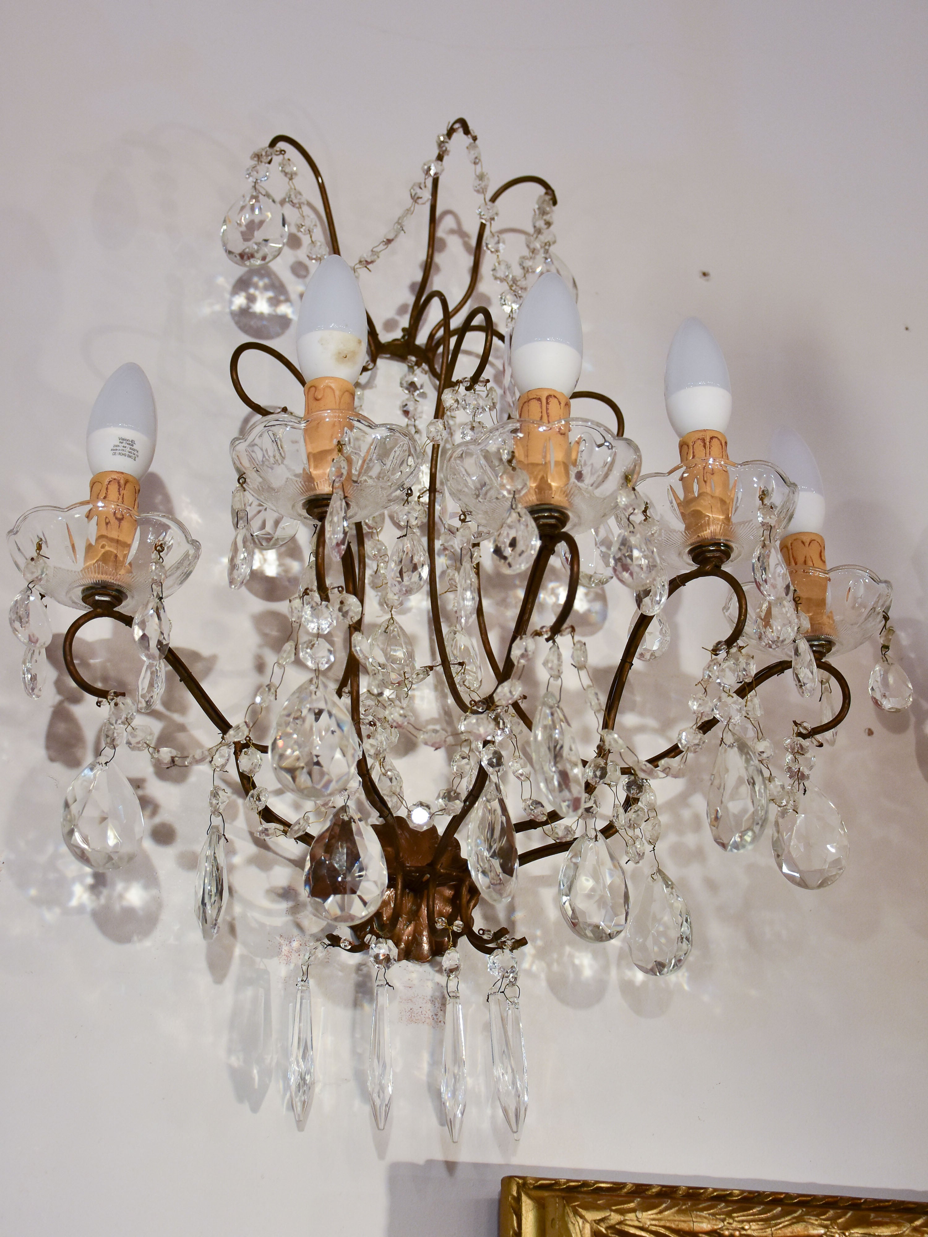 Set of four antique crystal wall sconces