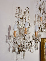 Set of four antique crystal wall sconces