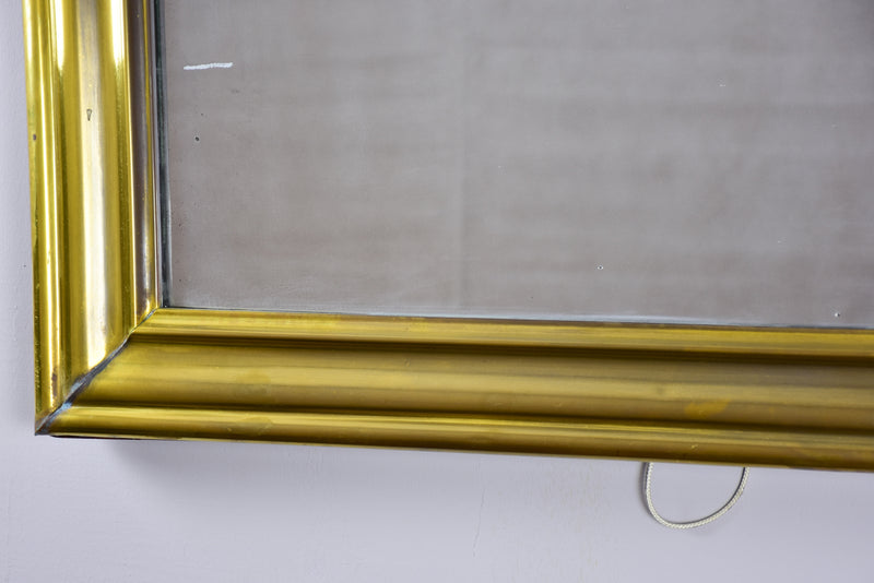 Antique French bistro mirror with brass frame