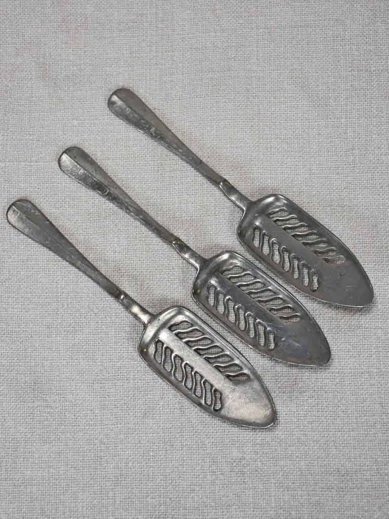 Collection of three absinthe spoons from the early twentieth-century