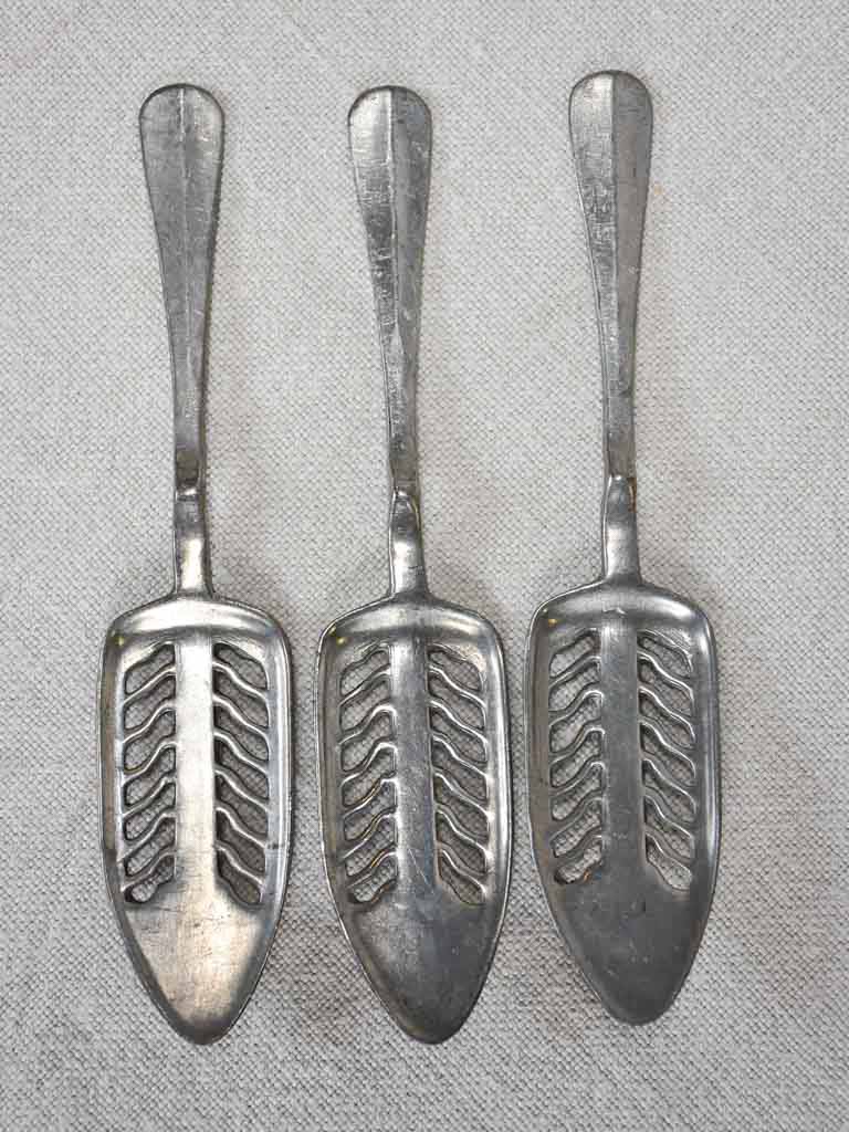 Collection of three absinthe spoons from the early twentieth-century