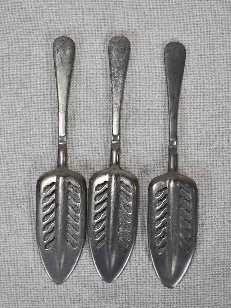 Collection of three absinthe spoons from the early twentieth-century