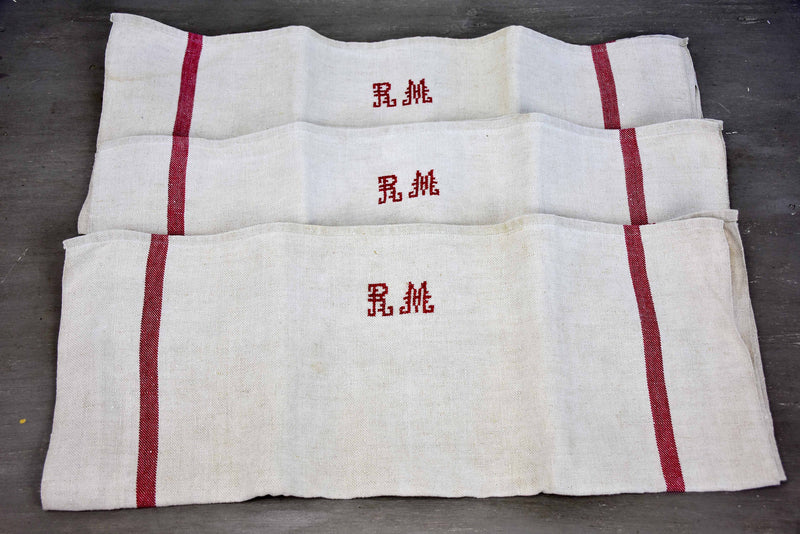 Two vintage French tea towels with large RM monogram