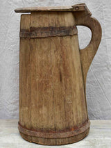 Primitive rustic wooden pitcher with lid