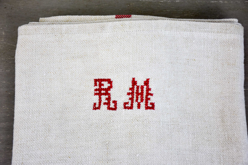 Two vintage French tea towels with large RM monogram