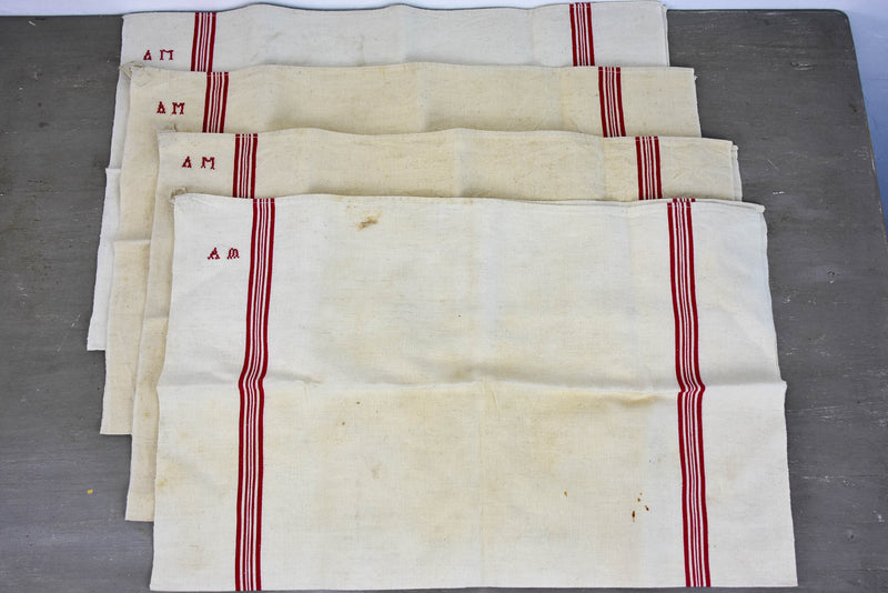Four vintage French tea towels with AM monogram