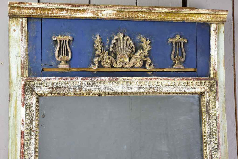 Pretty Louis XVI trumeau mirror with navy blue and fatigued gilding 25½" x 53½"