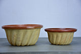 Two antique French terracotta Gugelhupf cake moulds