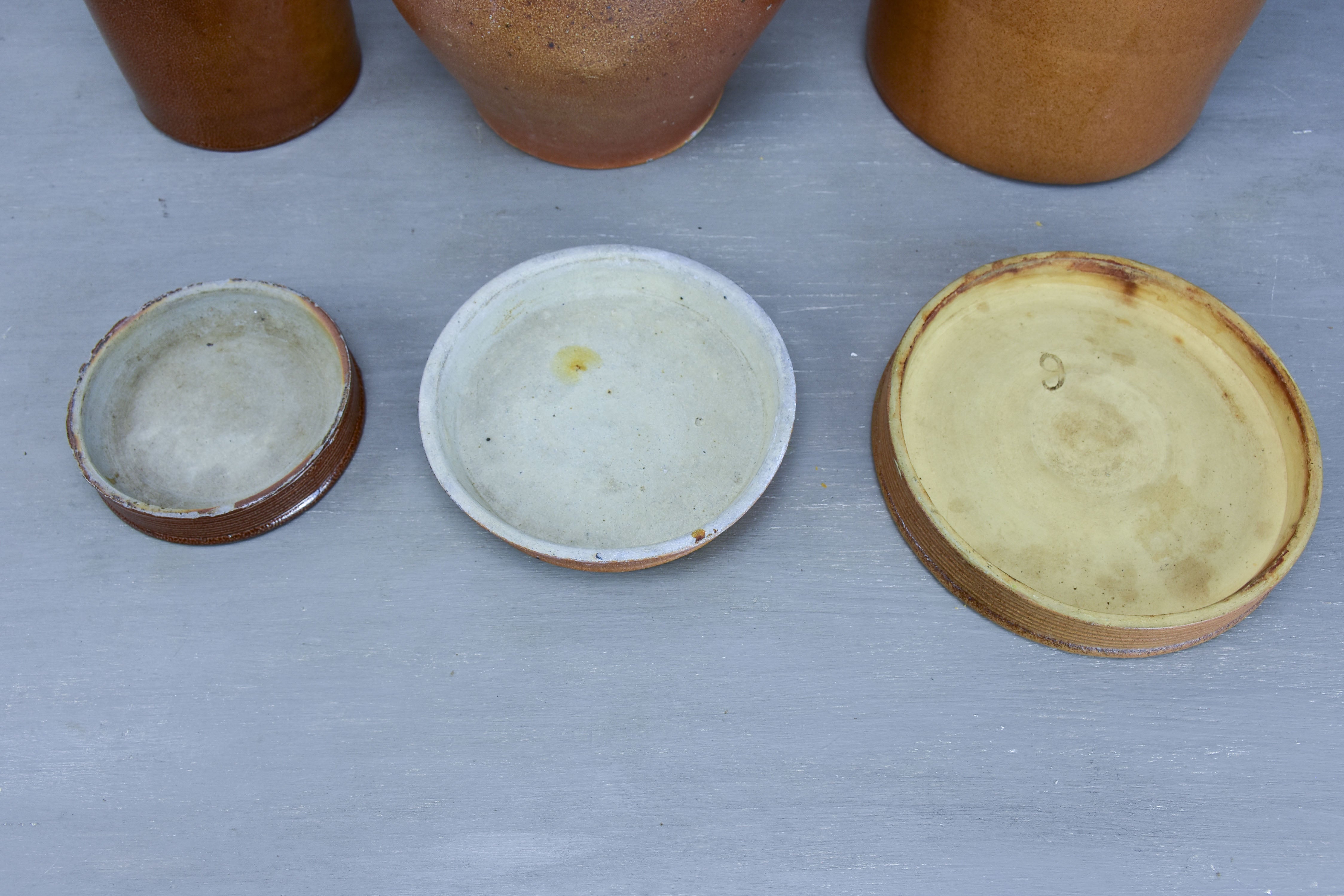 Three antique French earthenware preserving pots