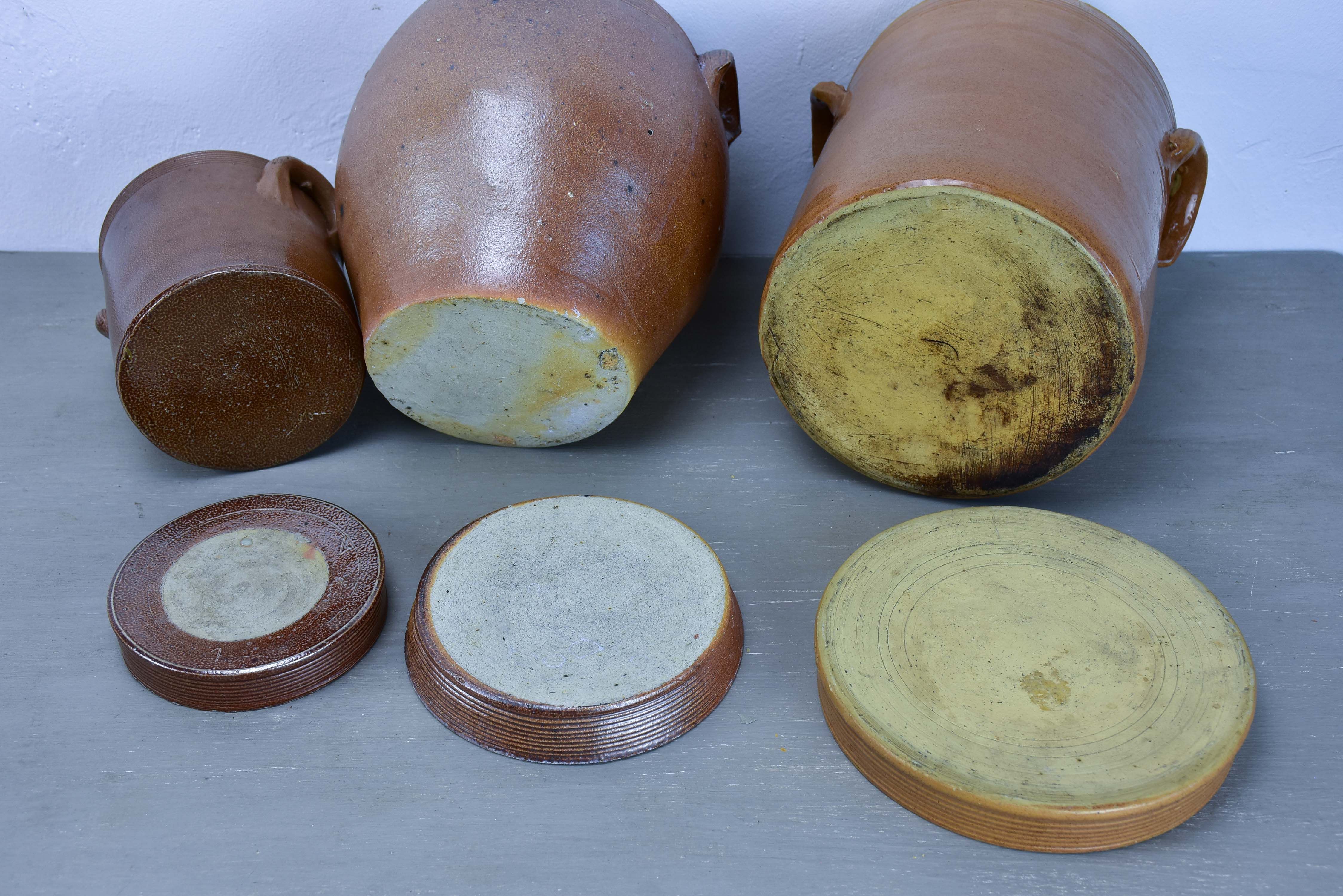 Three antique French earthenware preserving pots