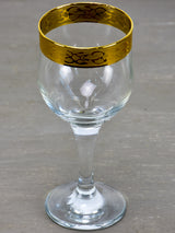 Six antique French wine glasses with gold rim