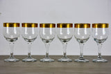 Six antique French wine glasses with gold rim
