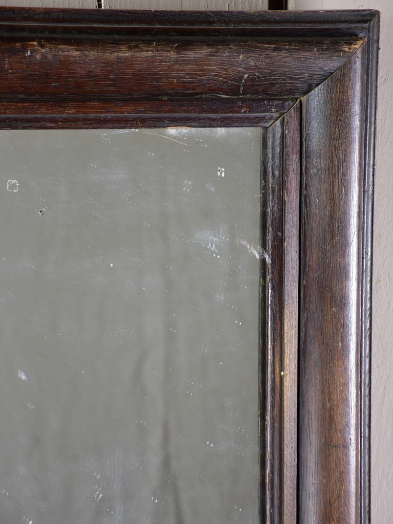 Late 19th Century French mirror with dark timber frame 22¾" x 28¼"