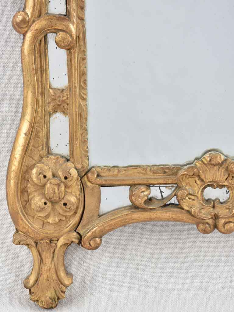 Small 19th century French mirror - gilded w/ bouquet pediment - 24¾" x 13¾"