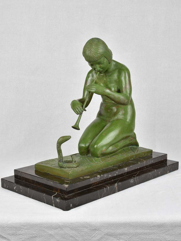 1930s bronze sculpture of a snake charmer