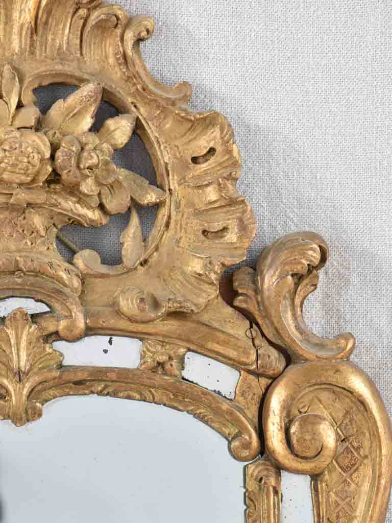 Small 19th century French mirror - gilded w/ bouquet pediment - 24¾" x 13¾"