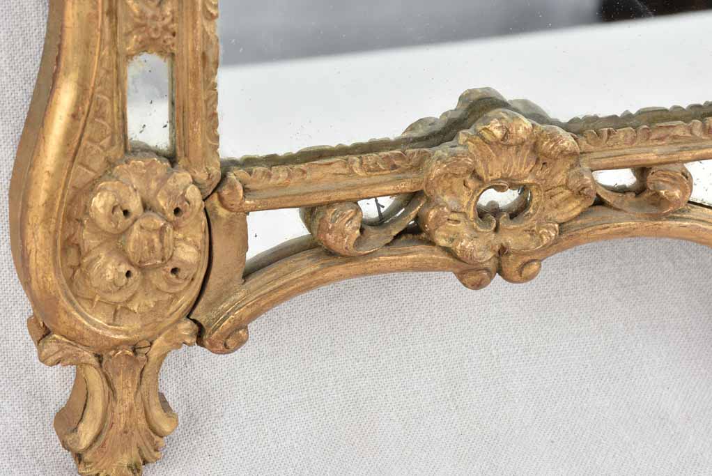 Small 19th century French mirror - gilded w/ bouquet pediment - 24¾" x 13¾"