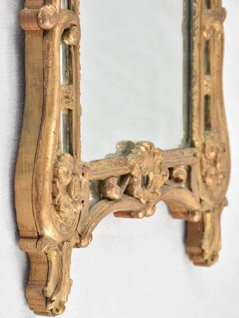 Small 19th century French mirror - gilded w/ bouquet pediment - 24¾" x 13¾"