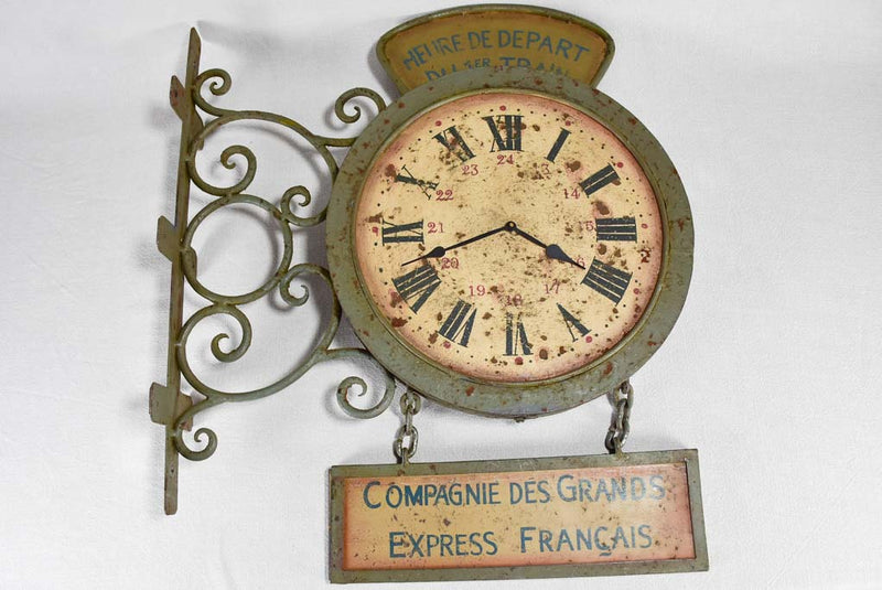 1950s clock and sign from a train station
