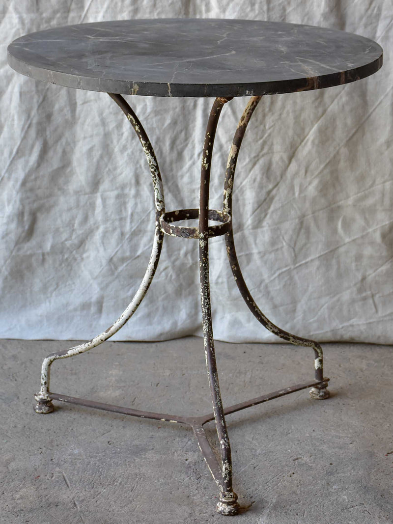 Antique French round garden table with black marble top