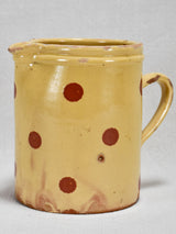 Antique French yellow glazed ceramic pitcher