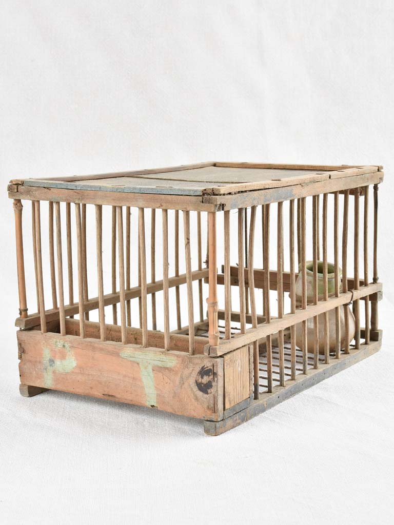 Decorative aged hunter's appel cage