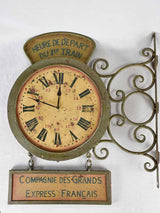 1950s clock and sign from a train station