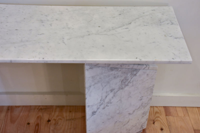 Vintage white marble console table with triangular legs