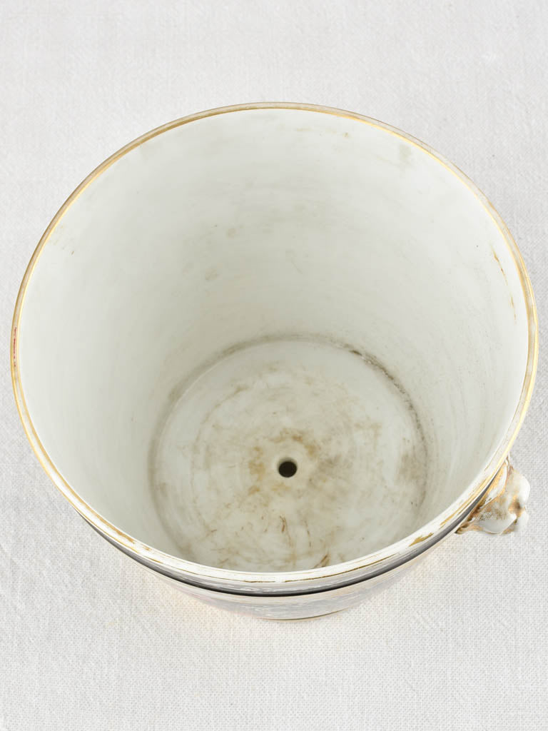 Decorative floral cachepot with lion heads