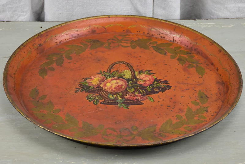 Napoleon III tole tray - round with basket of flowers and oak leaf decoration 17¾"
