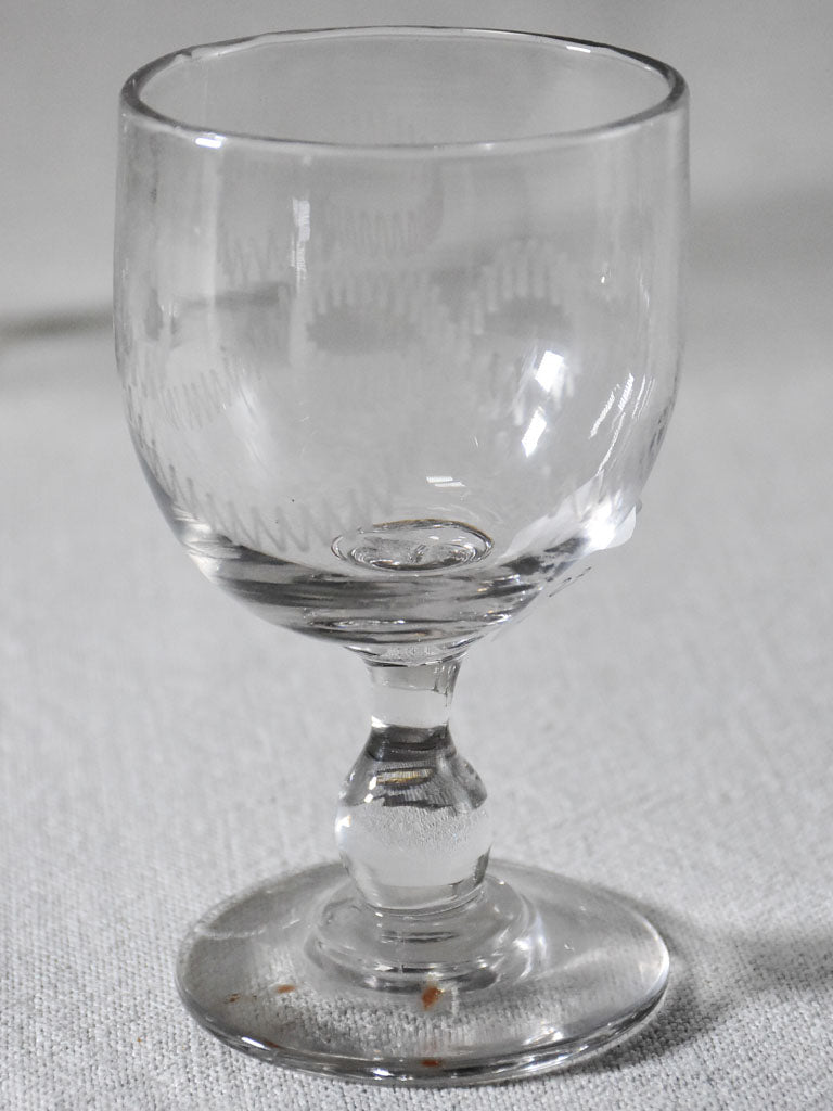 Six blown glass wine glasses with bow decoration