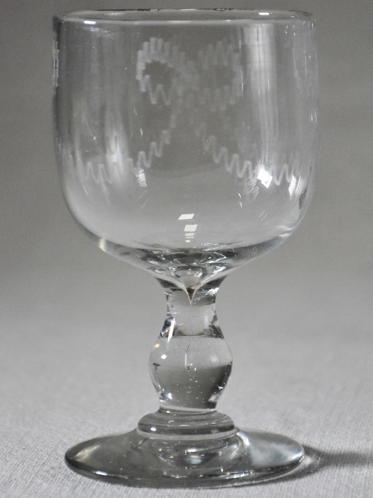 Six blown glass wine glasses with bow decoration
