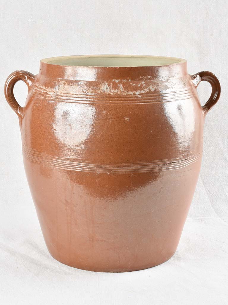 Very large antique crock pot with brown glaze