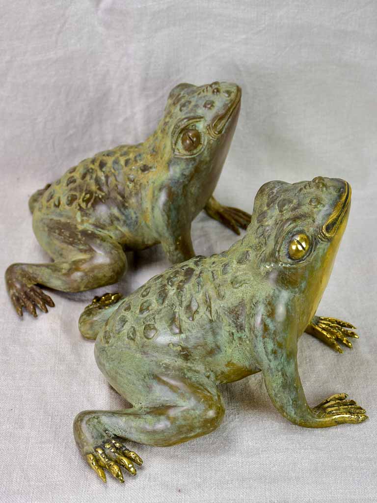 Pair of metal garden frog sculptures