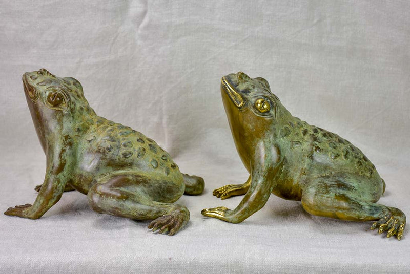 Pair of metal garden frog sculptures