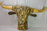Life-size bull's head made from driftwood