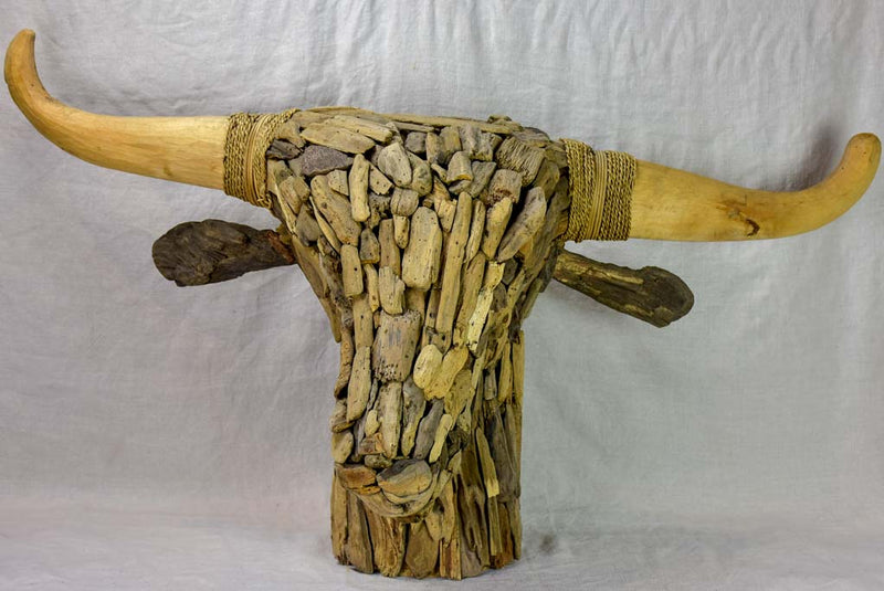 Life-size bull's head made from driftwood