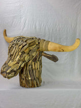 Life-size bull's head made from driftwood