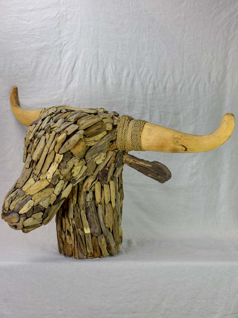Life-size bull's head made from driftwood