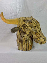 Life-size bull's head made from driftwood
