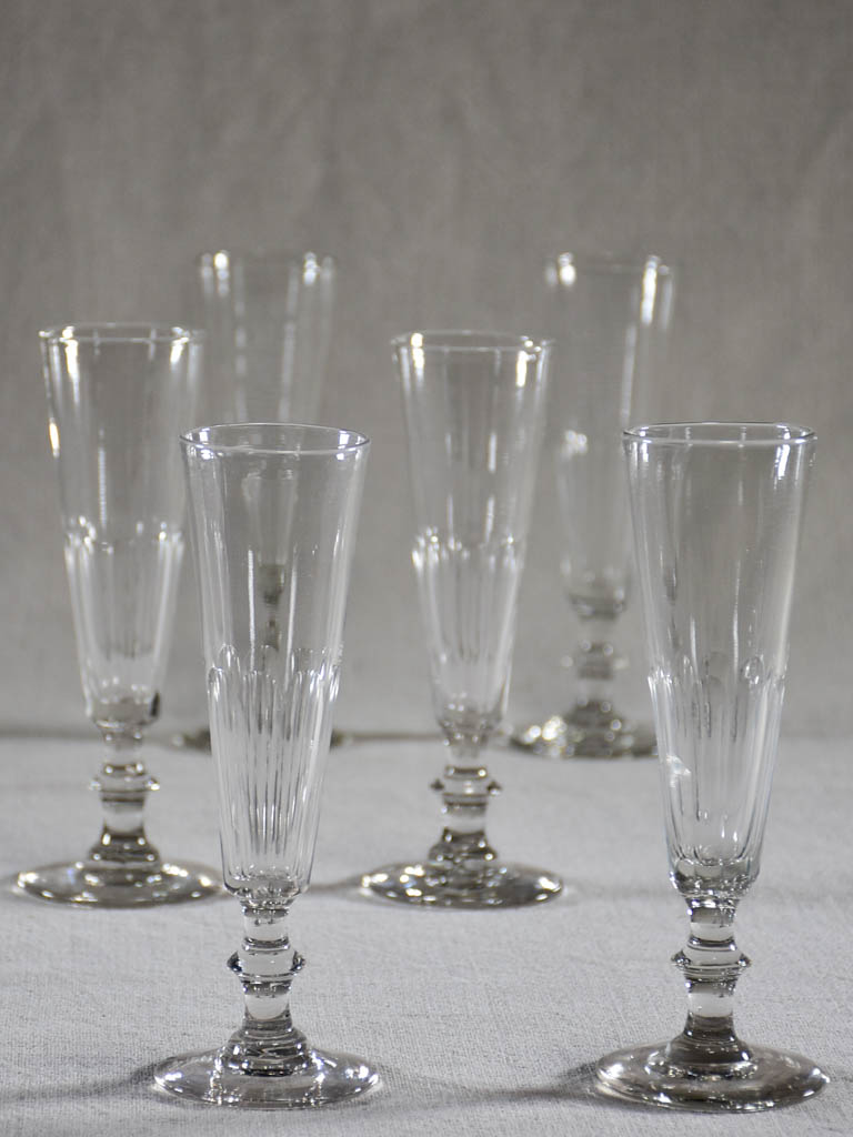 Set of six slender champagne flutes from the 1930's Chez Pluie