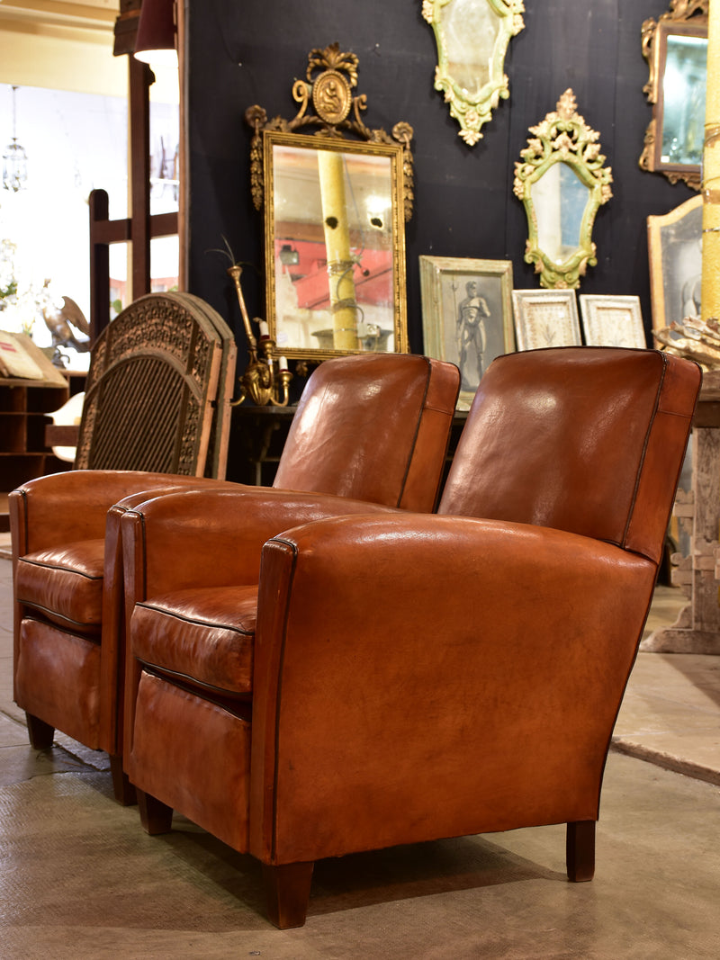Pair of vintage French leather club chairs with square backs