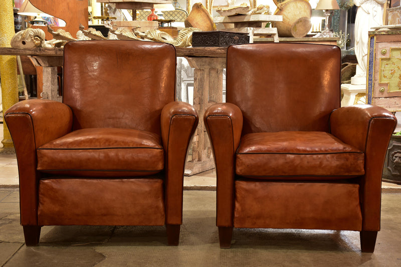 Pair of vintage French leather club chairs with square backs
