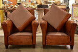 Pair of vintage French leather club chairs with square backs