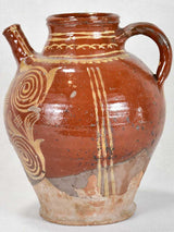 Late 19th century French water pitcher with brown glaze and beige decoration 12¼"