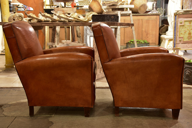 Pair of vintage French leather club chairs with square backs
