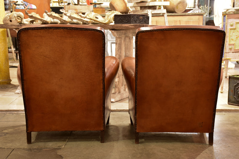Pair of vintage French leather club chairs with square backs