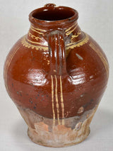 Late 19th century French water pitcher with brown glaze and beige decoration 12¼"